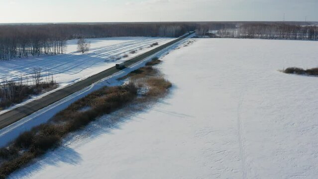 Trans-Siberian highway. Traffic on the Omsk - Novosibirsk AH6 "Irtysh" highway. Aerial view.