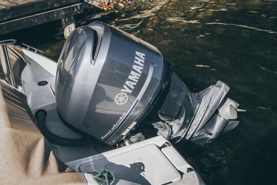 Yamaha four stroke outboard engine on the back of a motor boat on September 22, 2017 in Ryn, Poland.
