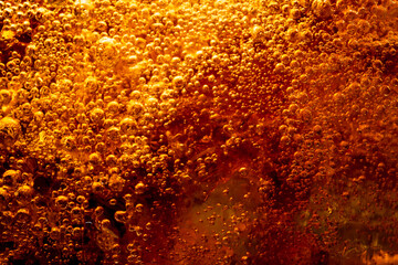 Fototapeta na wymiar Detail of Cold Bubbly Carbonated Soft Drink with Ice 