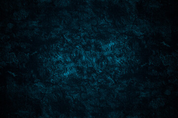 Fototapeta na wymiar Dark blue painted abstract grunge textured rustic surface of an old stone wall for background