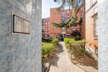 entrance portal to the residential apartment building with communications intercom