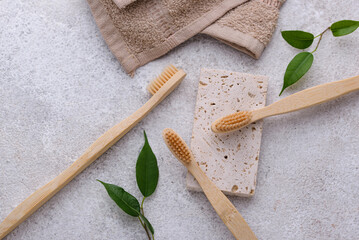 Fototapeta na wymiar Bamboo toothbrush, zero waste care products