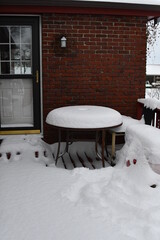 Snow on the Deck of a House