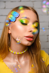 Girl with creative yellow-green make-up