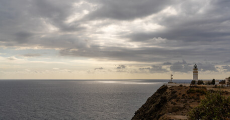 Fototapeta na wymiar the Cabo Sacratif lighthouse on the coast of Andalusia near Motril