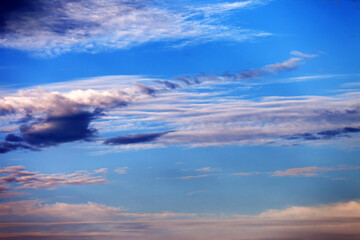 Fototapeta premium Sky with clouds at multicolored sunset
