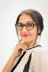 Studio photo of middle aged woman starting getting grey-haired wearing black and white clothes on white background, middle age sexy lady, happy life concept