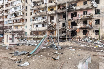 Fotobehang War of Russia against Ukraine. Residential building damaged in Kyiv © misu