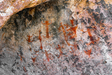Pictographs of people and animals painted on a rock in Leyva Escondido Spring, Big Bend Ranch State Park, Texas