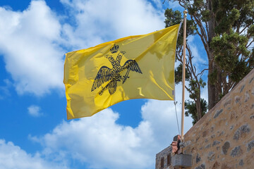 Religious flag at the St. Panteleimonas church, fortified island Spinalonga, Greece