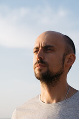 young man on the background of the sea. close-up.