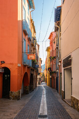 Fototapeta na wymiar Collioure traditional village street with colorful houses on the south of France