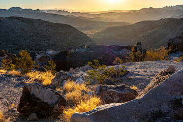 Distant mountain ridges, made visible by bright sun and light haze, stretch into the horizon, Rio Grande River Valley, Big Bend Ranch State Park, Texas