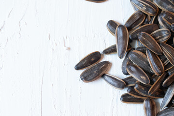 Sunflower seed appetizer horizontal line frame border copy text space on white background