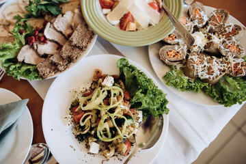 Top view table full of food in restaurant
