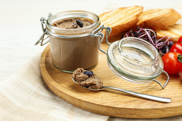 Delicious liver pate on wooden board, closeup view - obrazy, fototapety, plakaty