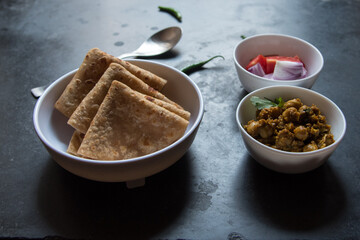 North Indian delicacy paratha or flat bread served with chana keema. Close up.