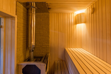interior of empty dry finnish and russian sauna bath