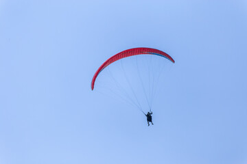 Paraplaners with beautiful blue sky and clounds in the background