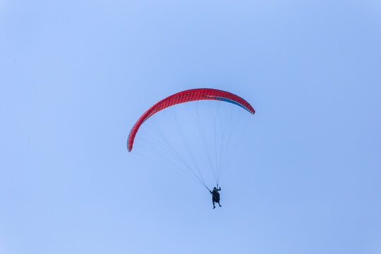 Paraplaners with beautiful blue sky and clounds in the background