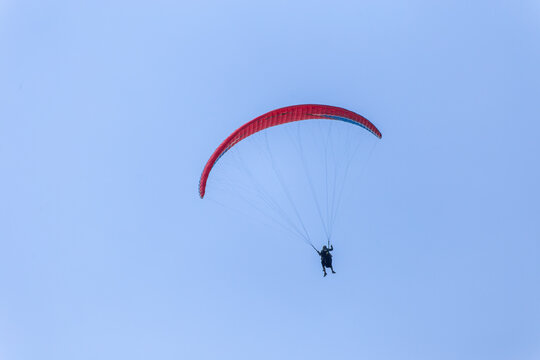 Paraplaners with beautiful blue sky and clounds in the background