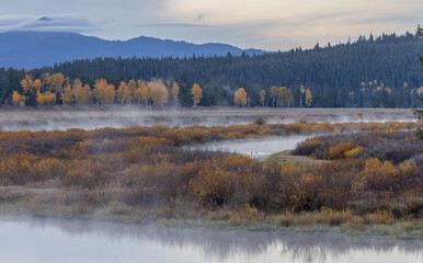 Obraz na płótnie Canvas Scenic Autumn Reflection Landscape in Grand Teton National Park Wyoming