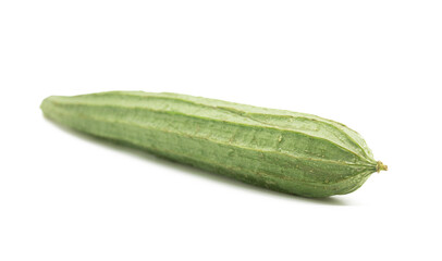 single Angled luffa selected over on white background, vegetable concept
