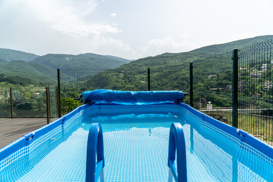 Outdoor protable pool with a mountain view