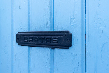 Letterbox in the door, traditional way of delivering letters to the house, old mailbox