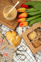 Peanut butter cookies with tulips. Crispy peanut butter cookies. Homemade vegan dessert. Vegan and vegetarian healthy food. Flatlay