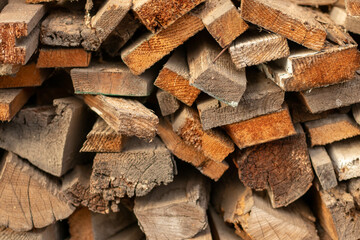 Stack of firewood. Pile of firewood. Background