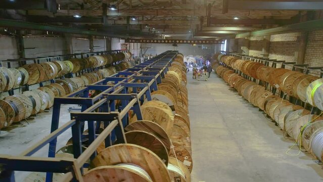 Coils with cable in stock, warehouse with coils with cable. Cable factory