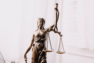 Male lawyer working with contract papers and wooden gavel on tabel in courtroom. justice and law ,attorney, court judge, concept.