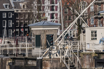 Amstel locks originally built in 1673, after canal belt had its fourth expansion. Amstel locks renovated in 19th century. Amsterdam, the Netherlands.