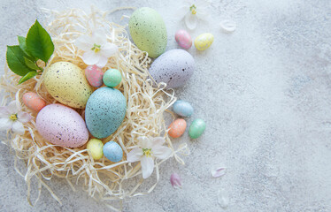 Fototapeta na wymiar Colorful Easter eggs on concrete background