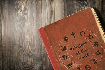Science of world religions book on wooden table