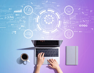 Future technology concept with person using a laptop computer