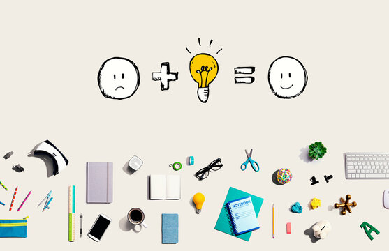 Good idea equals happy with collection of electronic gadgets and office supplies