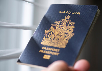 A person holds a Canadian passport