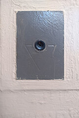 Elevator call button in an old apartment building