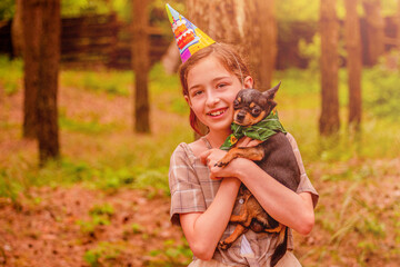 Birthday 11 year old teenage girl. Happy birthday girl with a black chihuahua dog.