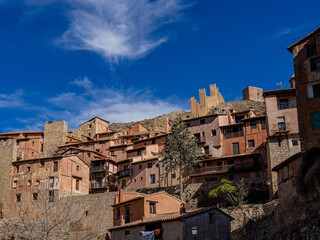 Fototapeta na wymiar landscape of the medieval town of Albarracin in the province of Teruel in Aragon, Spain. Albarracín medieval town in Spain, stone houses, walls, churches and narrow alleys.