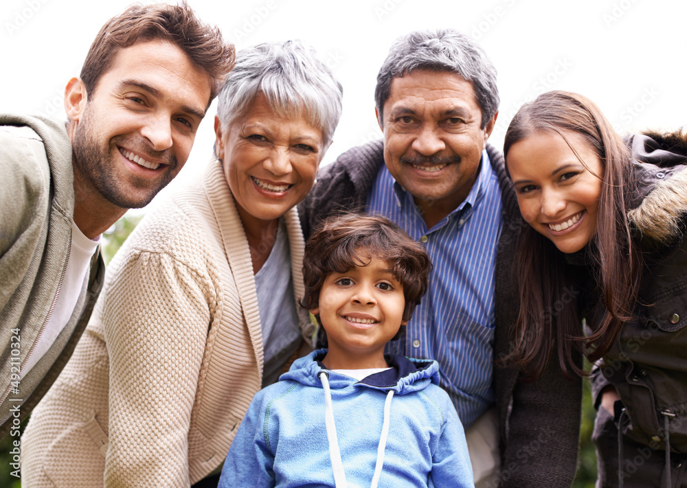 Poster Theyre a close-knit family. Shot of a multi-generational family posing for a self-portrait.