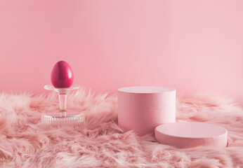 Pastel pink Easter composition with pink fur and egg. Suitable for Product Display and Business...