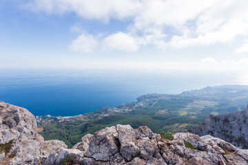 Fototapeta na wymiar Panoramic view of the city of Yalta from the Ai-Petri cliff. Crimean nature. The Republic of Crimea.