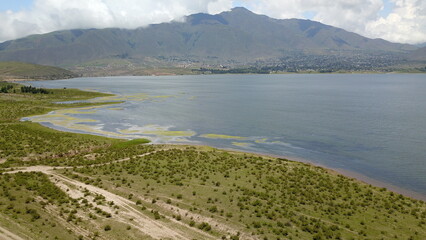 beautiful landscape with green mountains and lake in northwest Argentina
