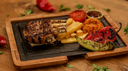 Professional product shot of meat serving plate on the table