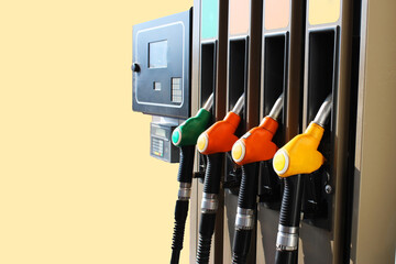 Red, green, yellow, orange color fuel petrol dispenser background. Space for text.