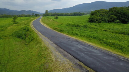 beautiful mountain road in green landscape in northwest Argentina