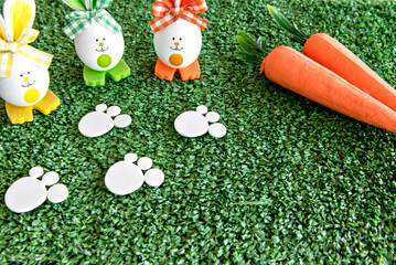 Easter Decoration with easter eggs on grass background.